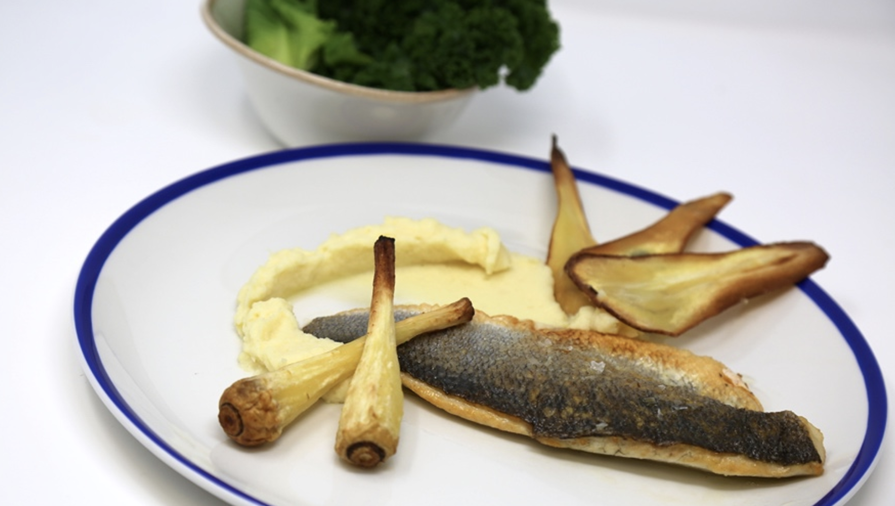 Pan fried sea bass with parsnip puree and honey roasted Heritage parsnips dish