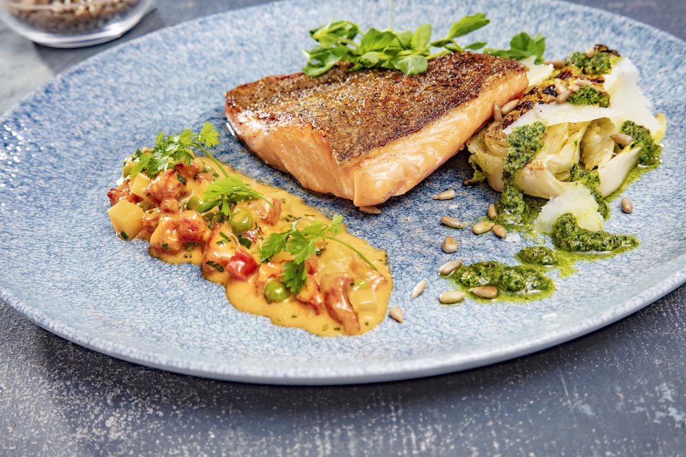 ChalkStream® Trout fillets, chorizo, peas, grilled little gem & shoots dish